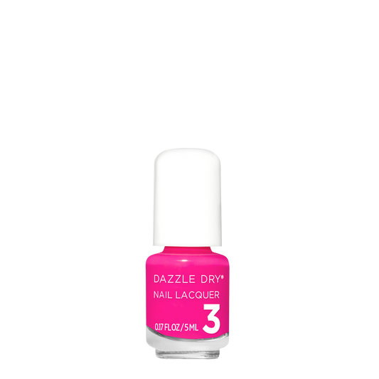 Pink nail polish bottle with white cap on a white background