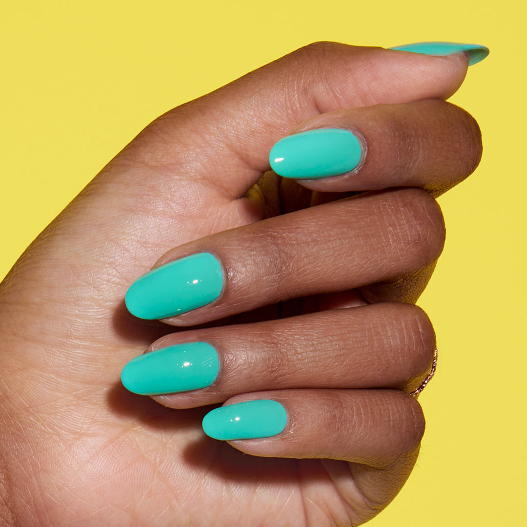Hand with Coastal Cabana painted on nails