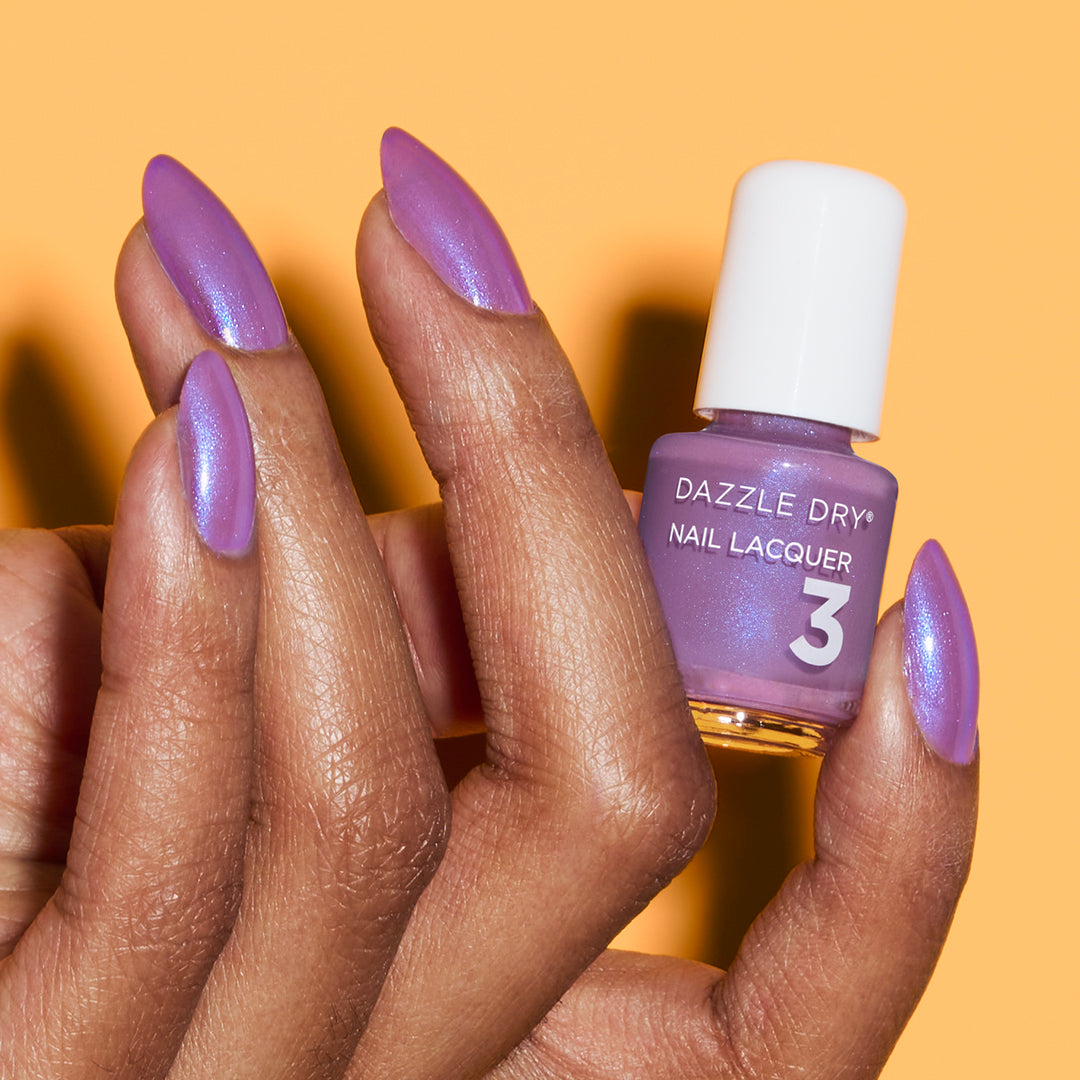 Hand Holding Mini Size Tropical Twilight Lacquer Painted on the nails