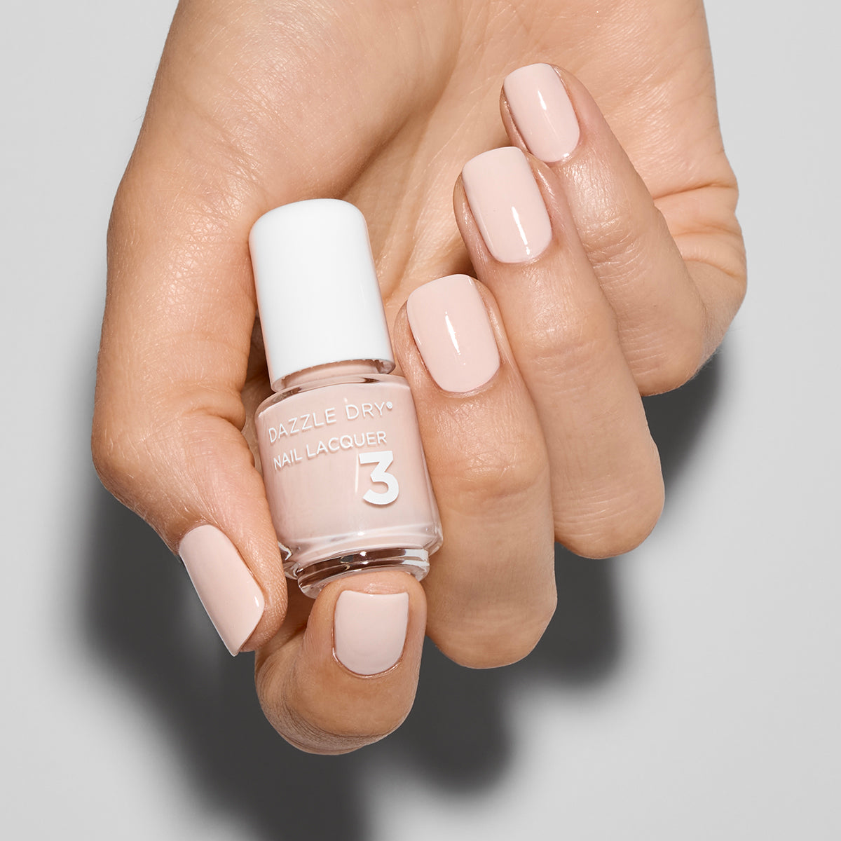 Hand Holding Mini Size So On Pointe Lacquer Painted on the nails