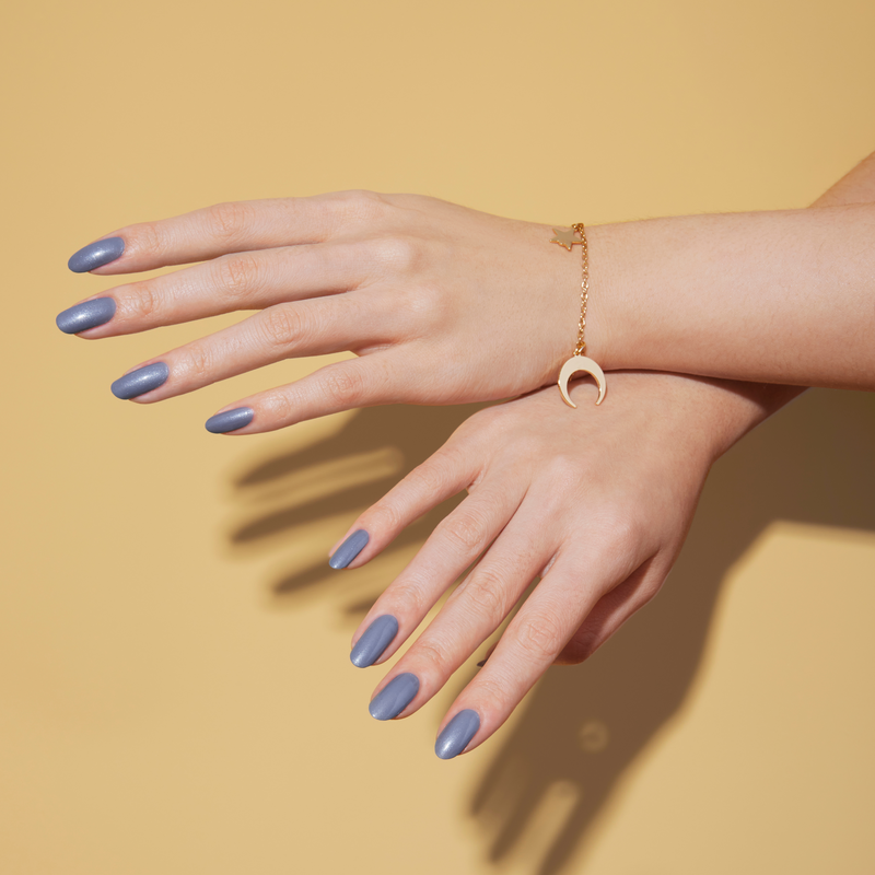 Hands with Blue Moon painted on nails