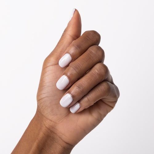 Hand with Breathe Free painted on nails