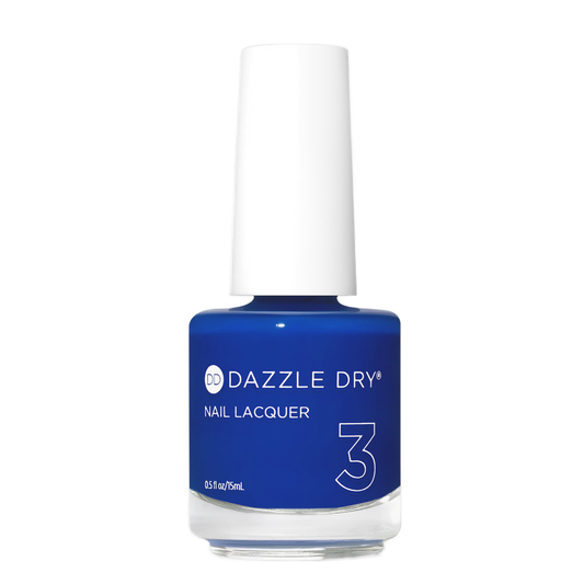 Blue nail polish bottle with 'Dazzle Dry' branding on a white background