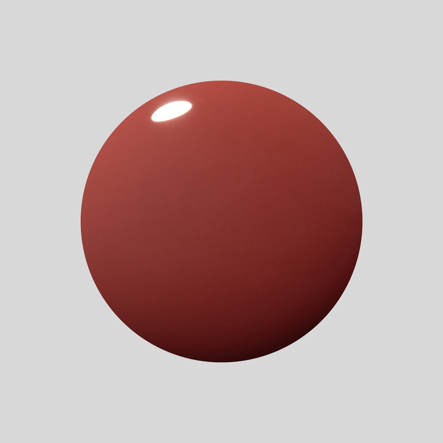 A glossy, smooth spherical color swatch in a muted brick red or terracotta shade, centered on a solid light gray background.
