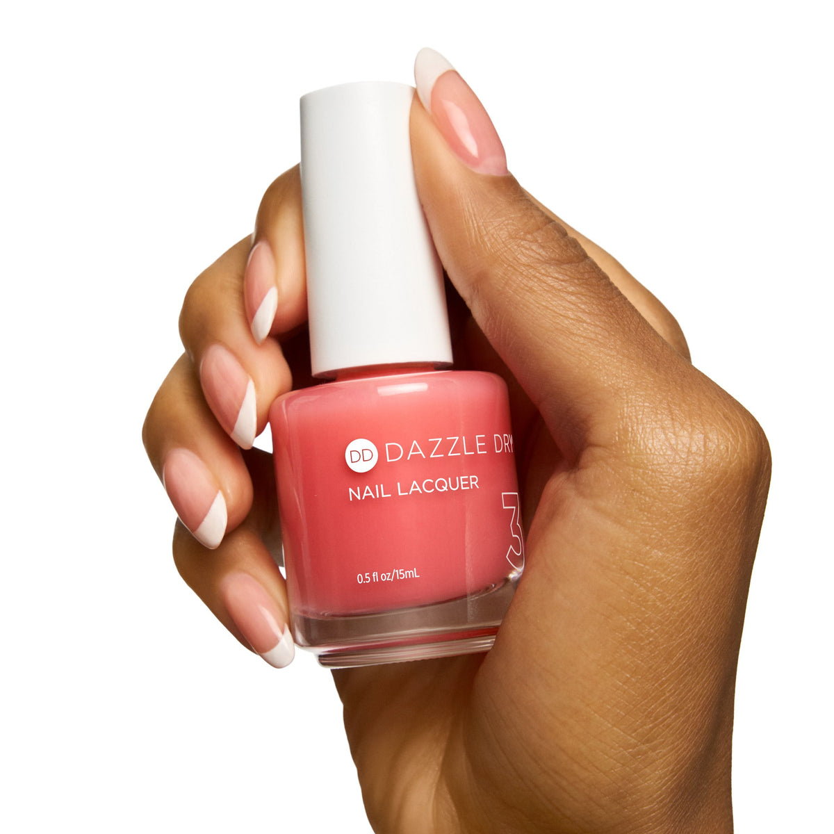 hint of pink bottle held in hand 