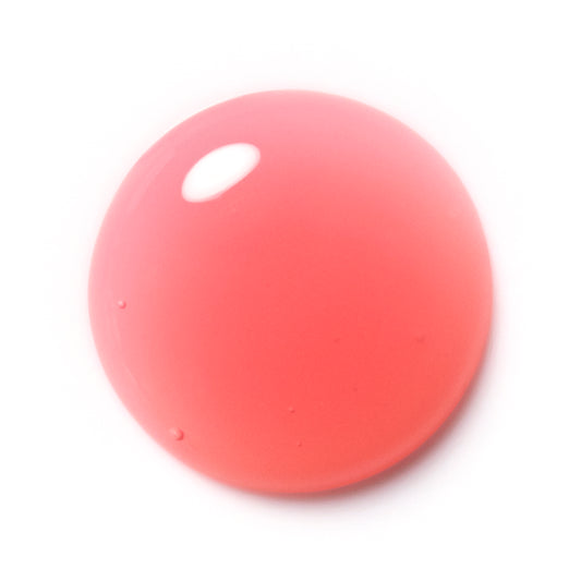 A glossy, translucent pinkish-red circular gel or silicone droplet on a solid white background.