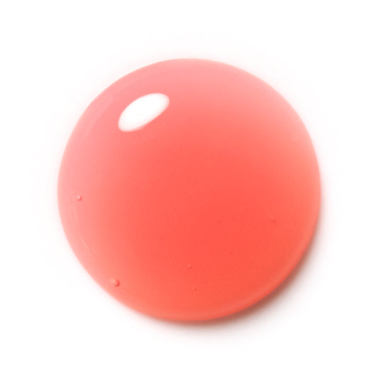 A glossy, translucent pinkish-red circular gel or silicone droplet on a solid white background.