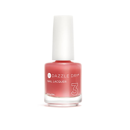 A bottle of Dazzle Dry Nail Lacquer in shade 3, featuring a coral pink lacquer visible through the clear glass bottle with a white cap, set against a plain white background.