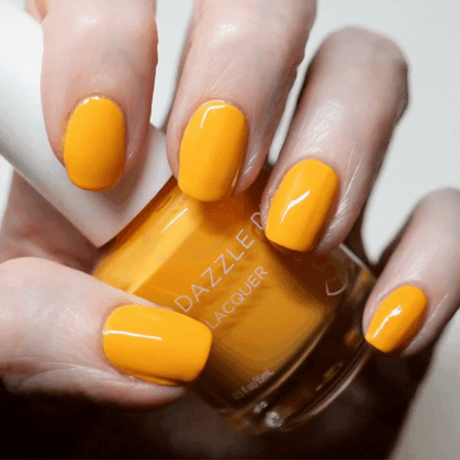 Hand Holding Mini Size Go Go Mango Painted on the nails