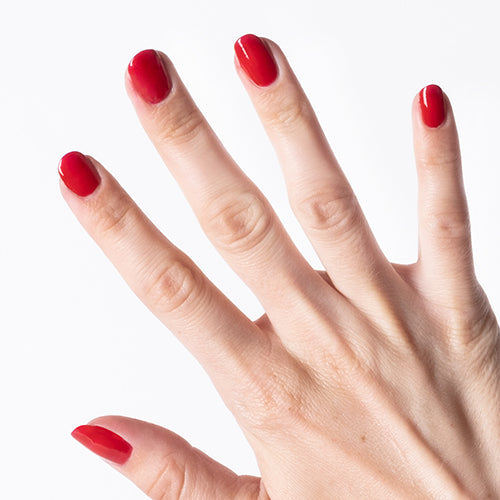 Hand with Lit painted on nails