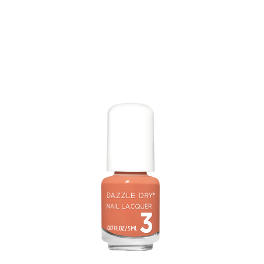 A bottle of Dazzle Dry Nail Lacquer in shade 3, featuring a peachy orange nail polish color visible through the clear glass bottle, with a white cap and white text on the label.