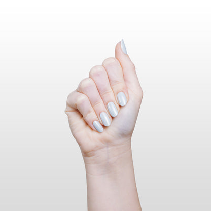 Hand with Moonlight painted on nails