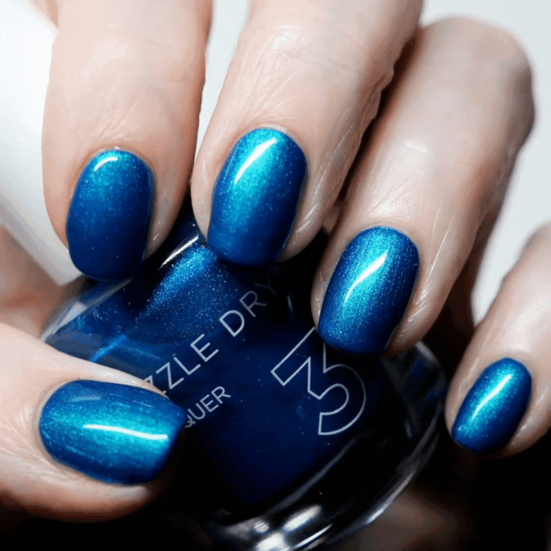 Hand Holding Mini Size Speed Boat Painted on the nails