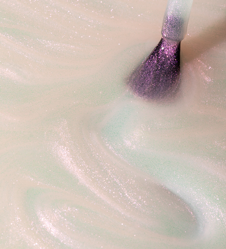 Close-up of a glittery makeup brush