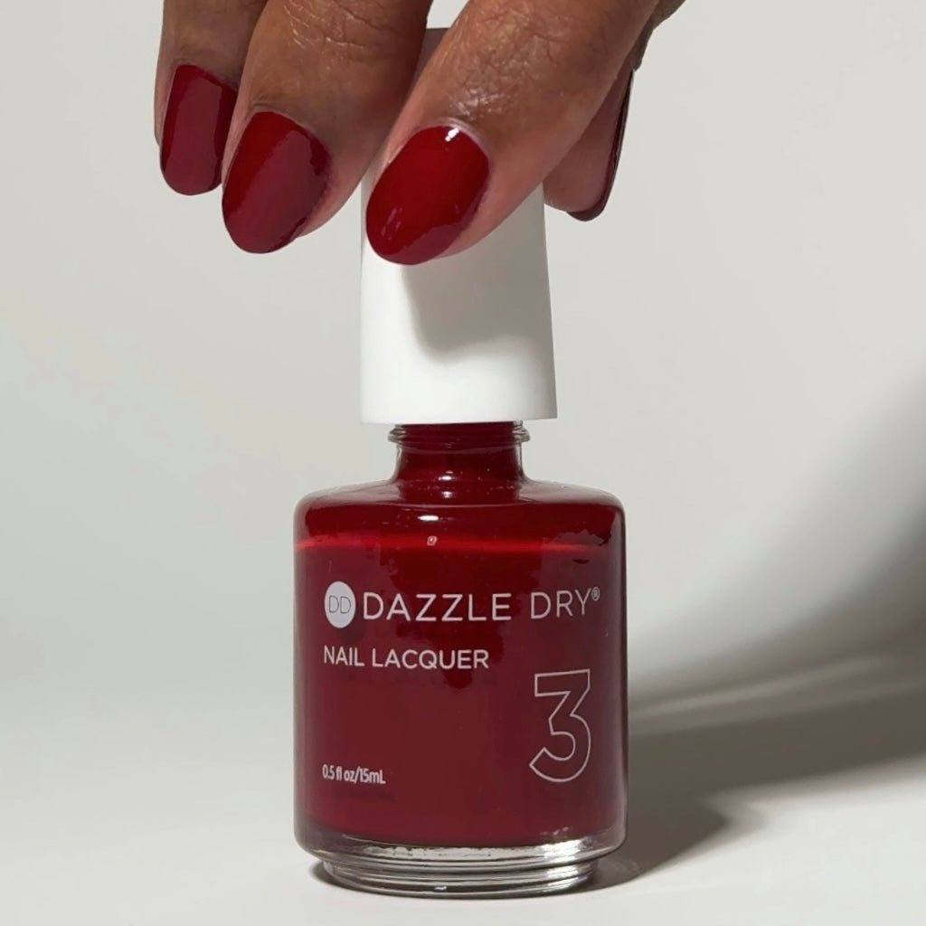 Applying Fast Track Cherry lacquer to nails