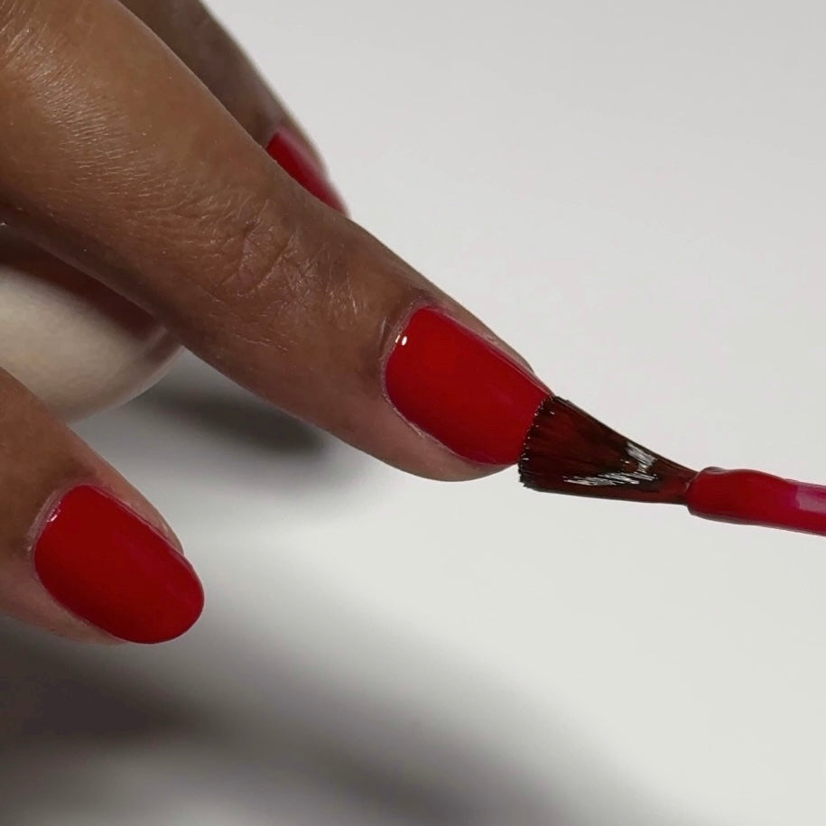 Applying Rapid Red on nails