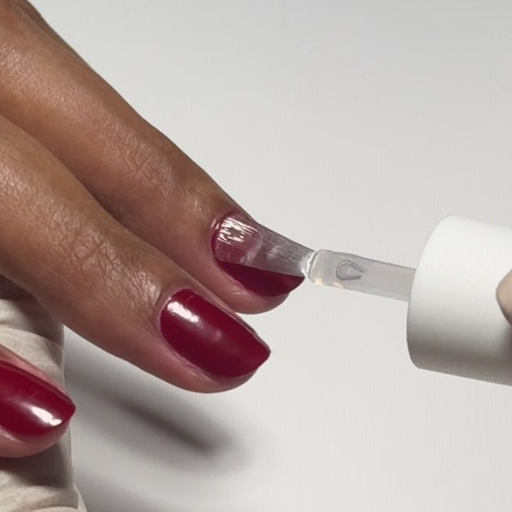 Applying Fast Track Cherry lacquer to nails