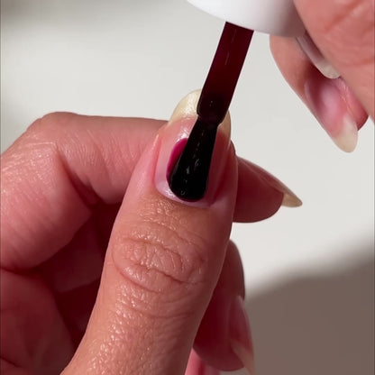 Video of red nail polish painted on nail