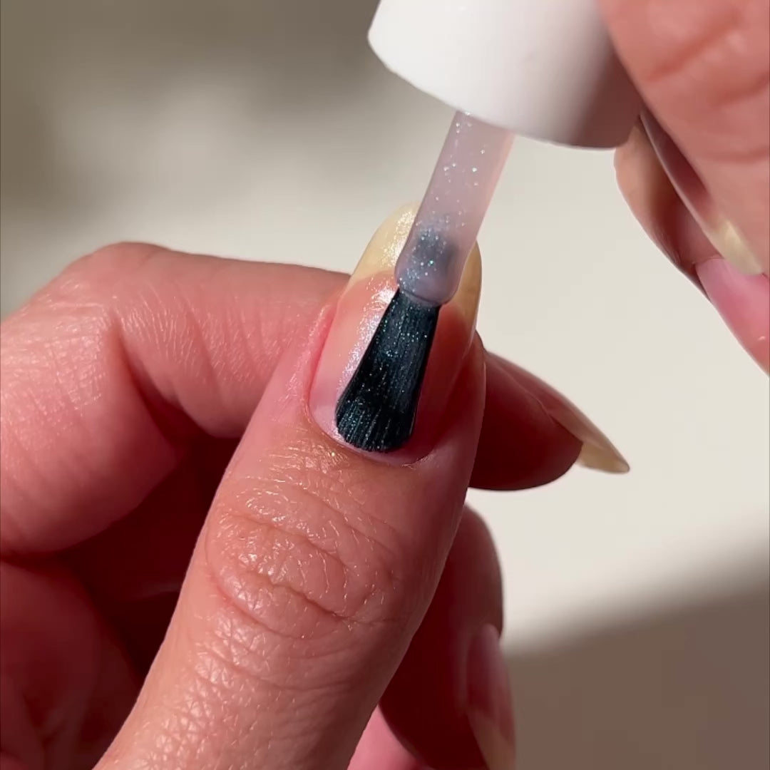 video of nail polish being painted on nails