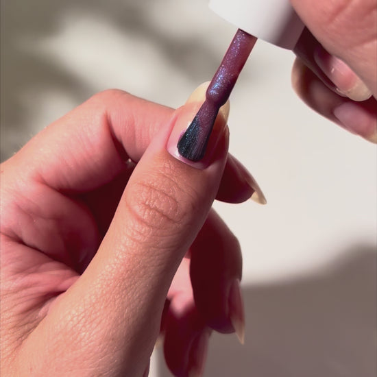 Painting School Spirit on nails