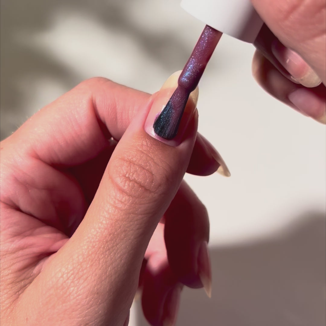 Painting School Spirit on nails