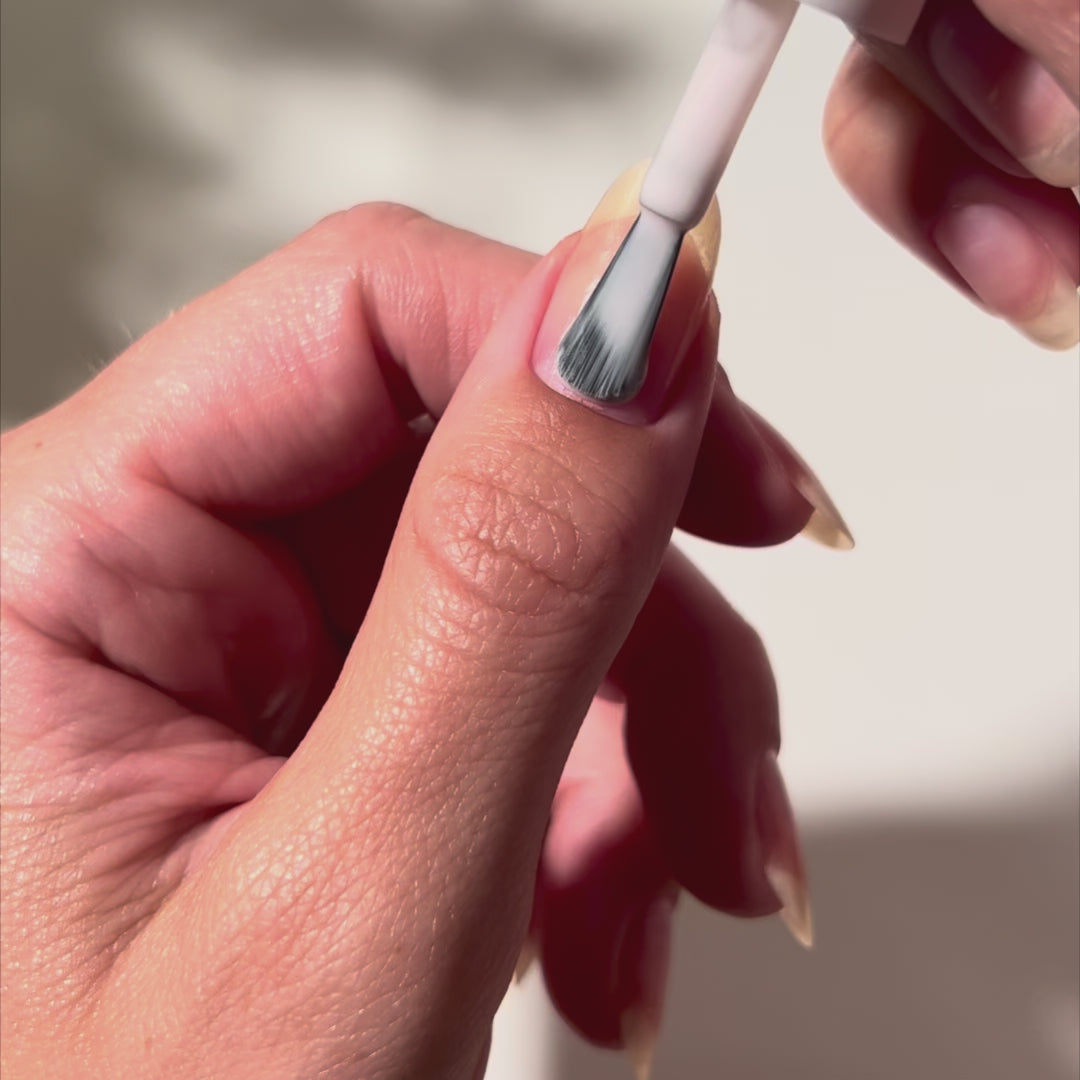 Painting Touch of Love on nails