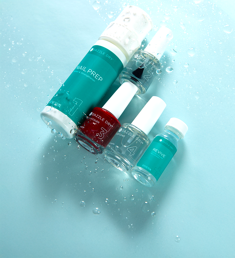 Set of nail polish bottles with a blue gradient background