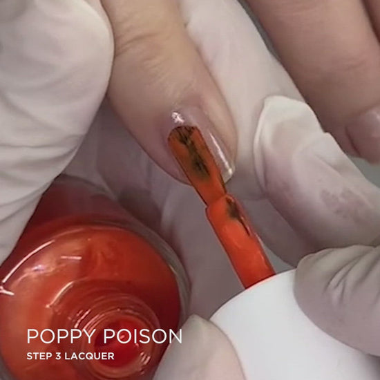 Painting Poppy Poison on nails