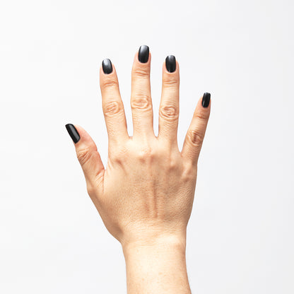 Hand with Bold painted on nails