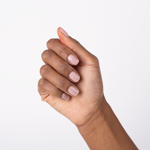 Hand with Livin' La Vida Yoga painted on nails