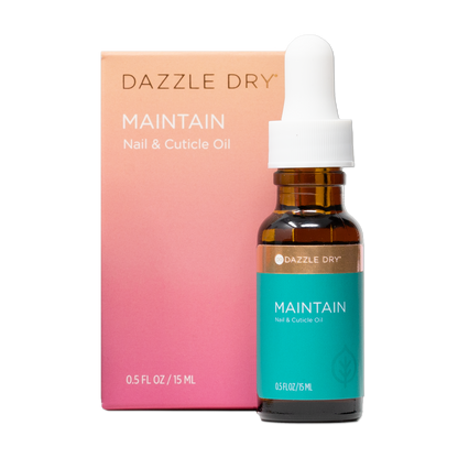 0.5oz Maintain Nail & Cuticle Oil next to packaging