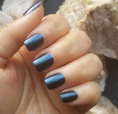 Hand with Blue Blood painted on nails