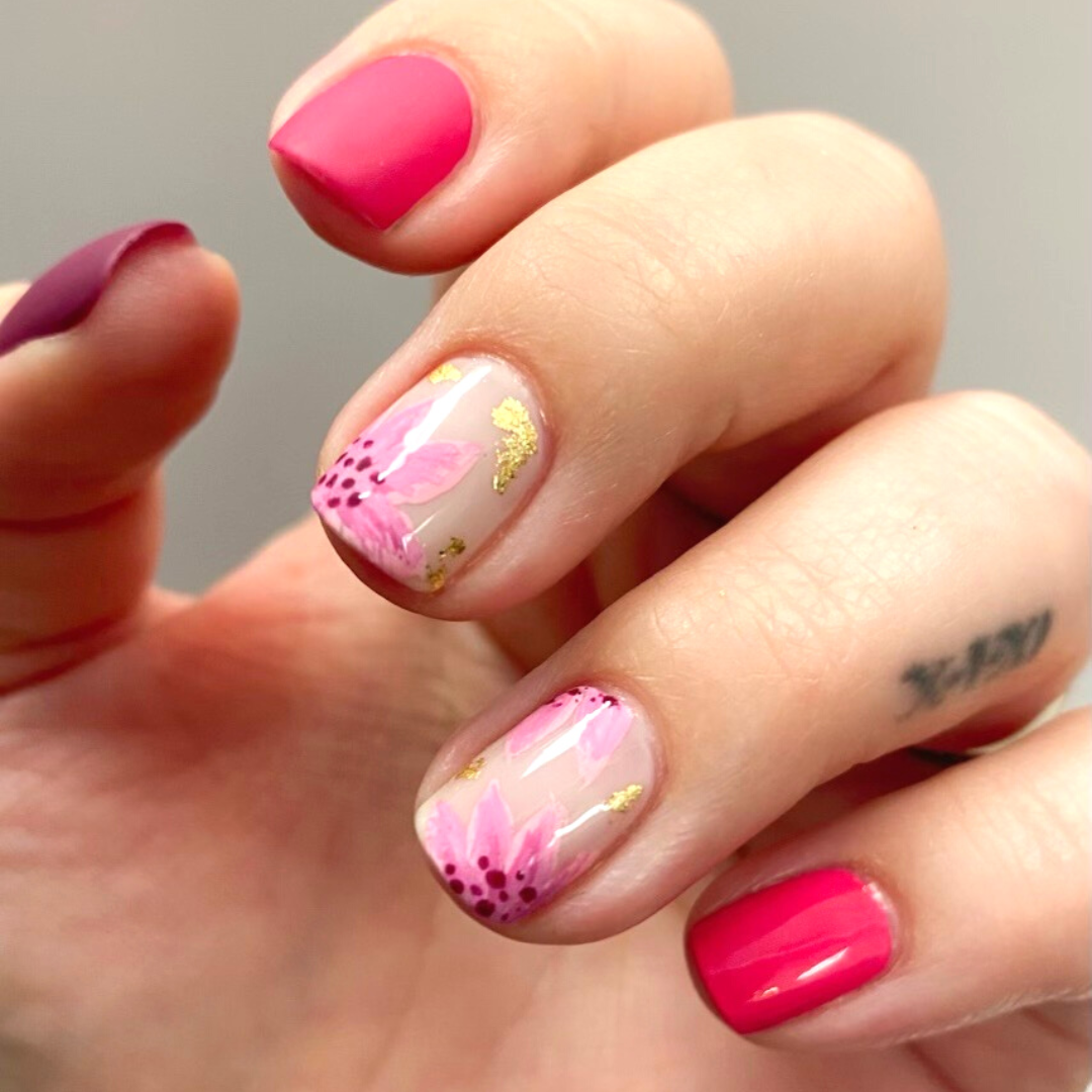 Hand with Coronado Mini Flight shades painted on nails