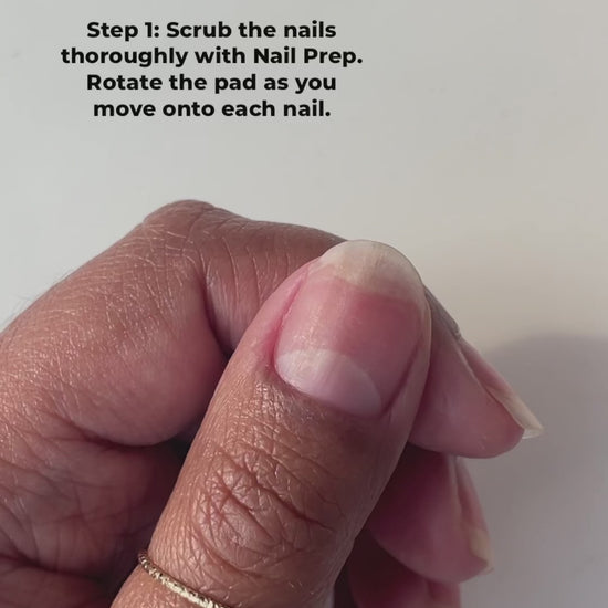 Painting Heartbreaker on nails